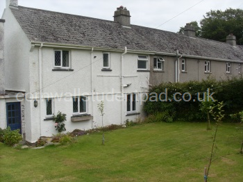 REAR VIEW OF THE HOUSE AND GARDEN