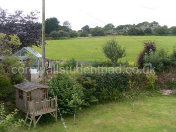 VIEW FROM BEDROOM 3 OF BACK GARDEN AND OPEN FIELDS